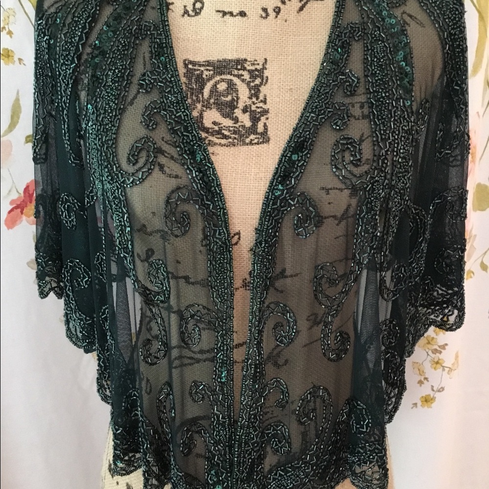 NWT elegant shrug from Unique Vintage